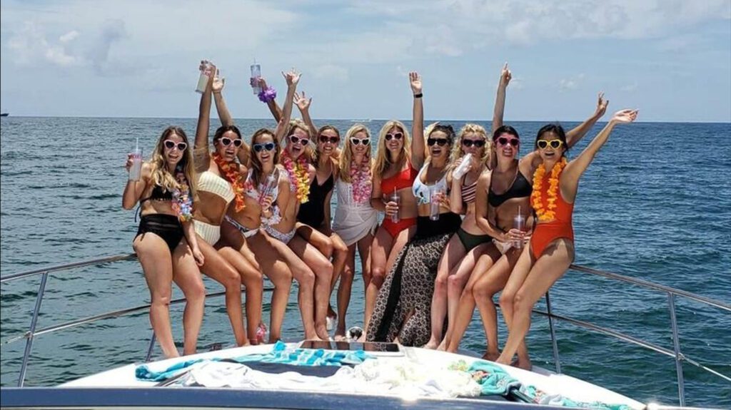 Friends having themed party on luxury yachts